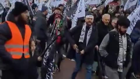 Muslims marching through London flying the ISIS flag