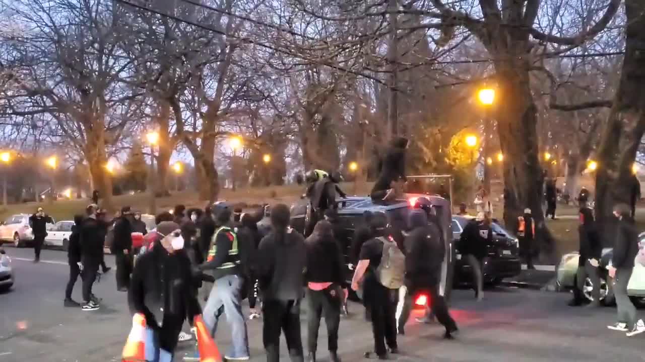 Portland Antifa flip an occupied vehicle