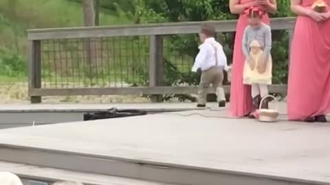 Kid add some comedy to wedding