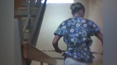 Bored Nurse Tries To Ride Broomstick Down Stairwell