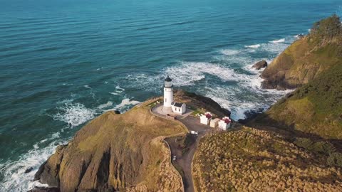 A Lighthouse By The Sea