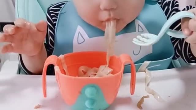 This child is sleepy and hungry at the same time 🤣 Cute baby funny video.