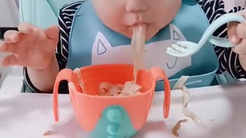 This child is sleepy and hungry at the same time 🤣 Cute baby funny video.