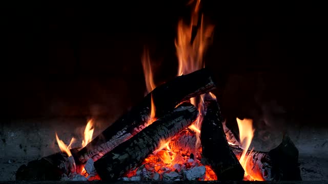 very close to drone fireplace footage || see the fire