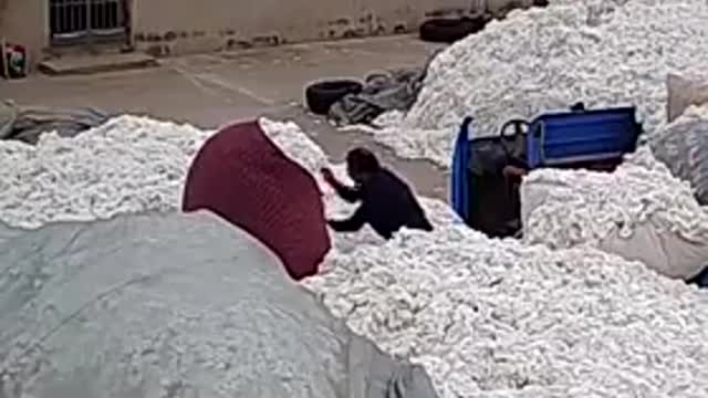 Using a lighter to open plastic bags at a COTTON WAREHOUSE...?