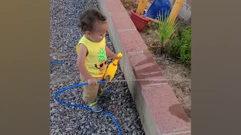 Funny Babies Playing With Water