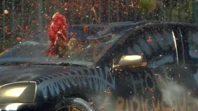 beat the watermelon fruit into BWM car