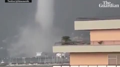 Dramatic waterspout forms off Italian port city