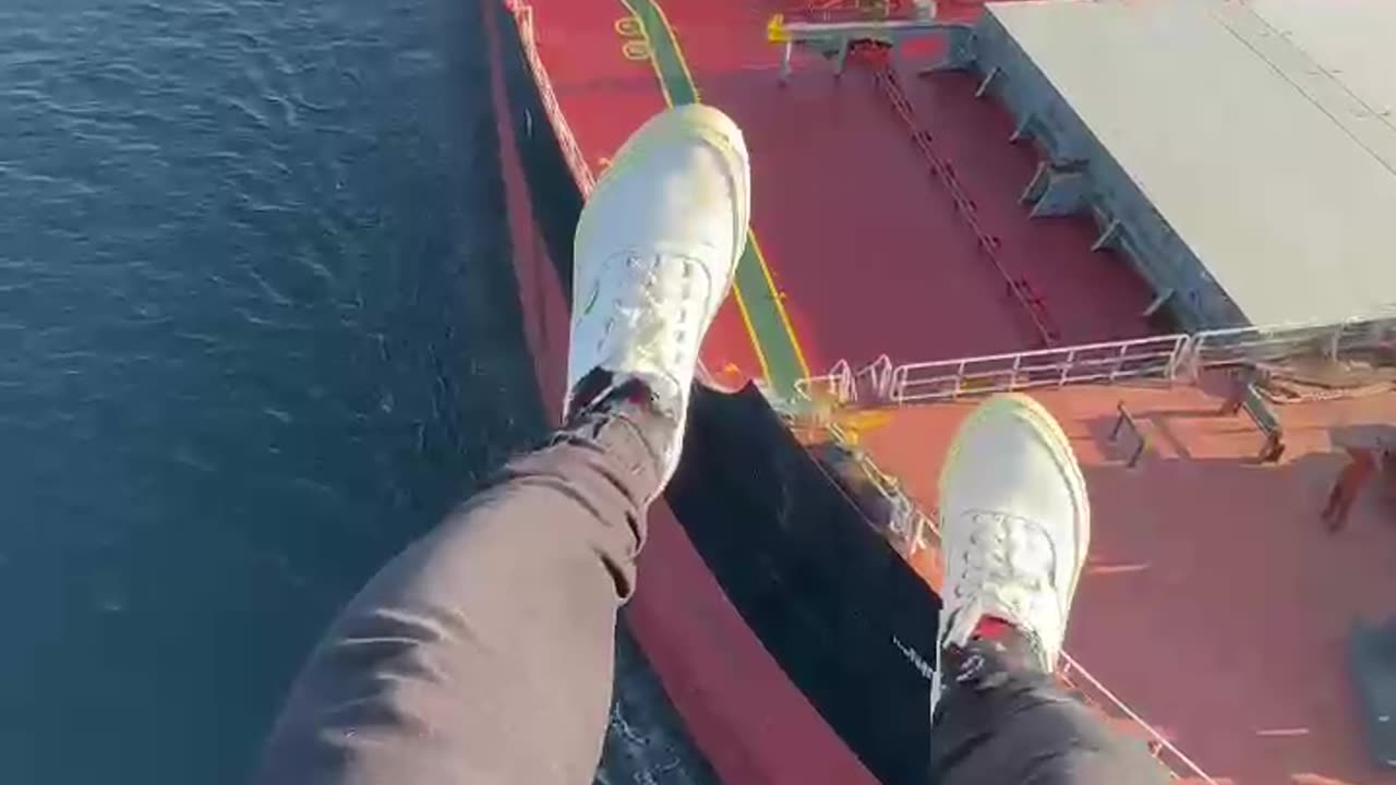 Paramotor Pilot Experiences Sudden Turbulence Over Cargo Ship