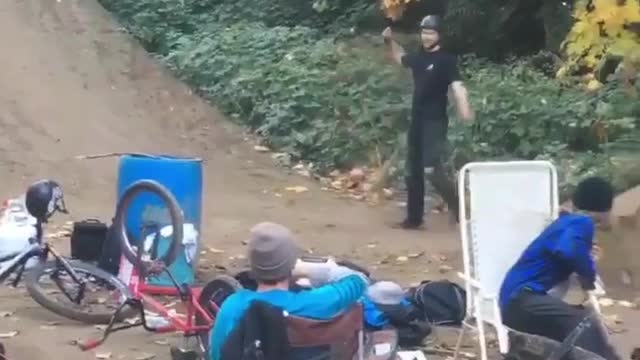 Guy black clothes backflip bike fail dirt hill ramp