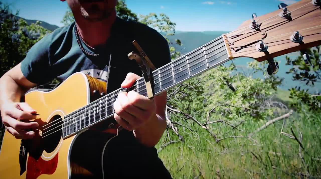 Singing "Ain't That A Shame" by the lake