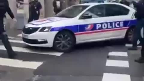 Lyon, France: Protesters chase police through the streets.