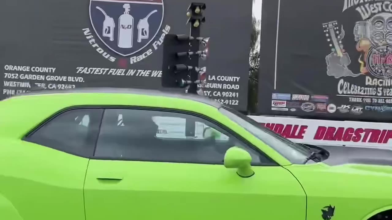 Hellcat does a wheelie off the line