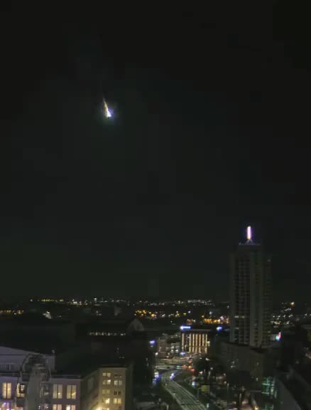Asteroid exploding in the sky above Germany