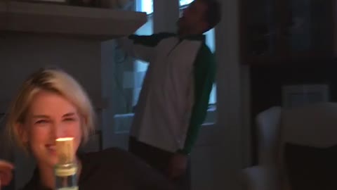 Cat trying to scratch guy