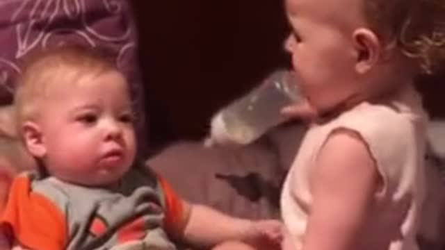 Toddler hilariously attempts to bottle feed baby brother hhhhhhh funny