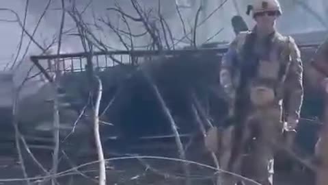 American Volunteers Show off Destroyed Tank