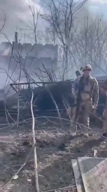 American Volunteers Show off Destroyed Tank