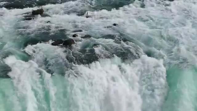 Water rushing down a great waterfall