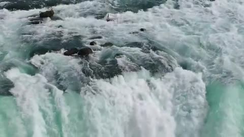 Water rushing down a great waterfall