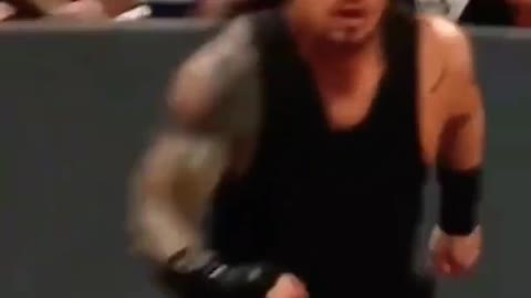 WWE Roman Reigns Superman punch