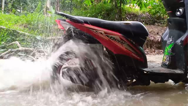 Amazing.!! washing motorbike in the river