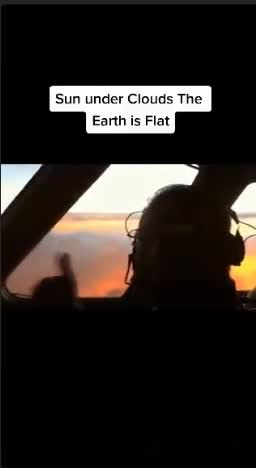 sun under clouds and earth is flat