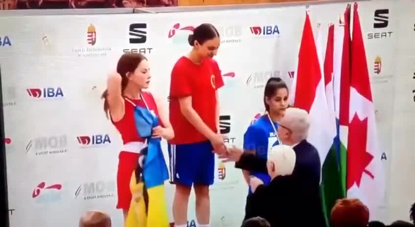 Ukrainian athlete at a competition in Hungary unfurled the flag of "Azov". But she was asked not to