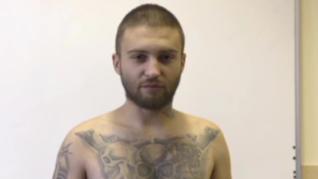 Ukrainian prisoner painted from head to toe with tattoos