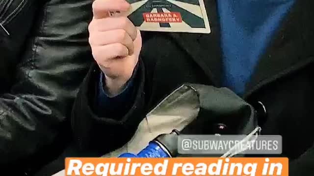 A citizens guide to impeachment woman reading book