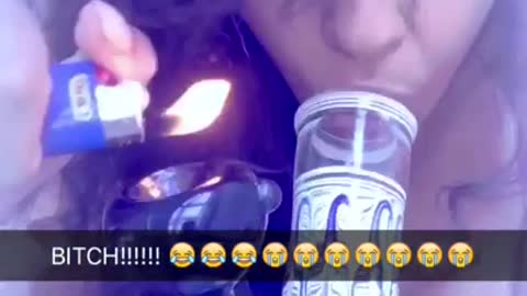 Snapchat filter girl lights her hair on fire while lighting bong