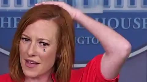 Jen Psaki has a moment with a fly.