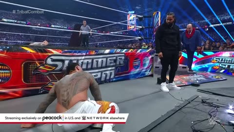 "Chaos in the Ring: Roman Reigns Takes on The Usos"