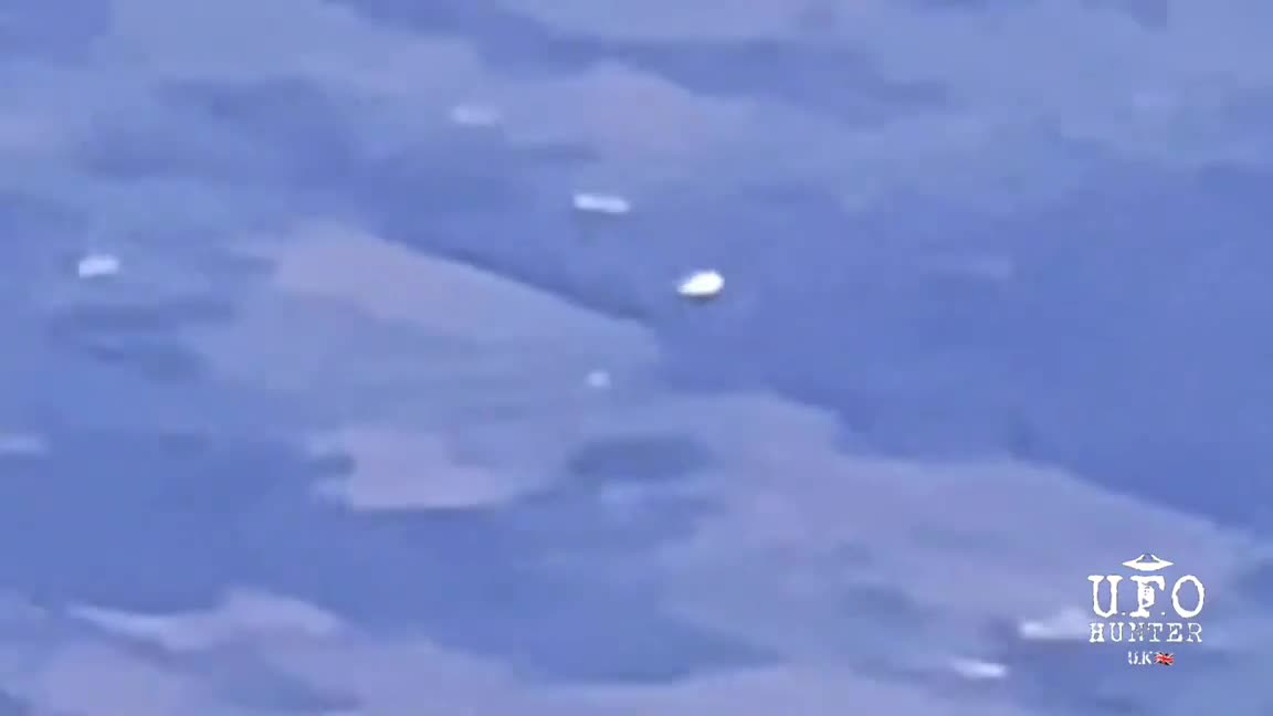 Tic-Tac shaped object filmed from flight UA267 from Boston, MA to Denver, CO on October 17th, 2021