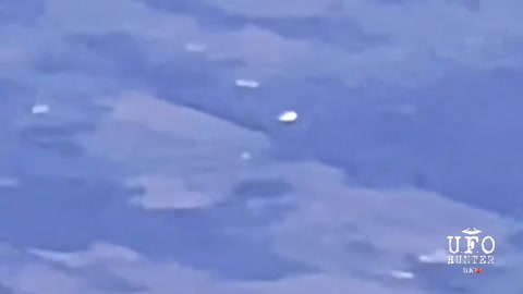 Tic-Tac shaped object filmed from flight UA267 from Boston, MA to Denver, CO on October 17th, 2021