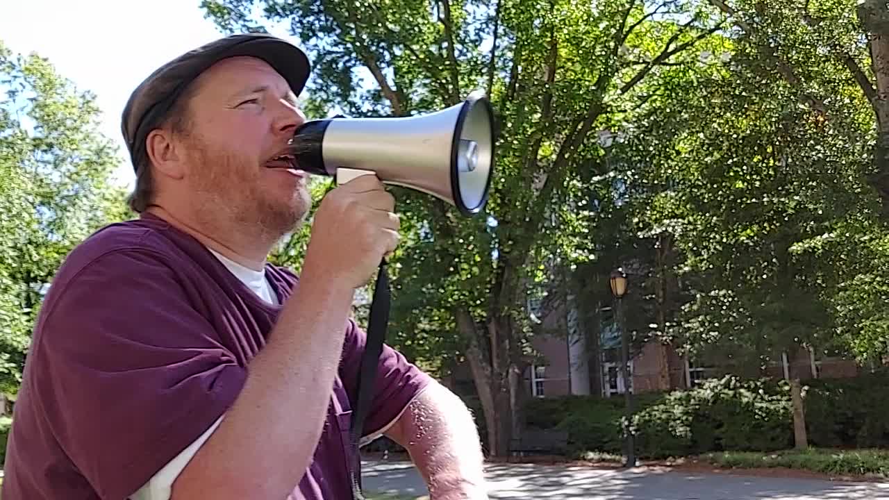 Preaching in Athens, GA at University of Georgia: Two Students Interact With Me