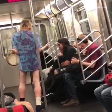 Pantless man tye dye shirt blond hair