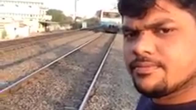 Train Crashes on man who was making live video.