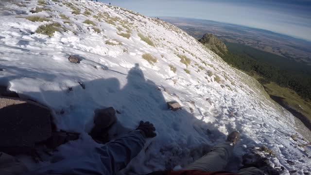 Climber Saved from Scary Slide Off Snow Ramp