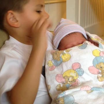 Young Boy Has Strange Response To His Newborn Sister