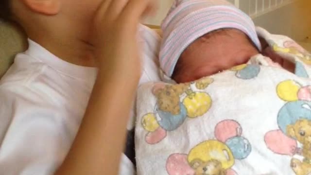 Young Boy Has Strange Response To His Newborn Sister