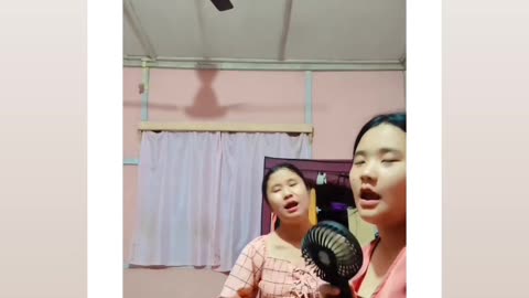 Two women's singing a song mujhe khana pasand he