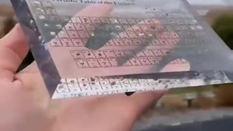 This periodic table uses real element samples encased in clear acrylic