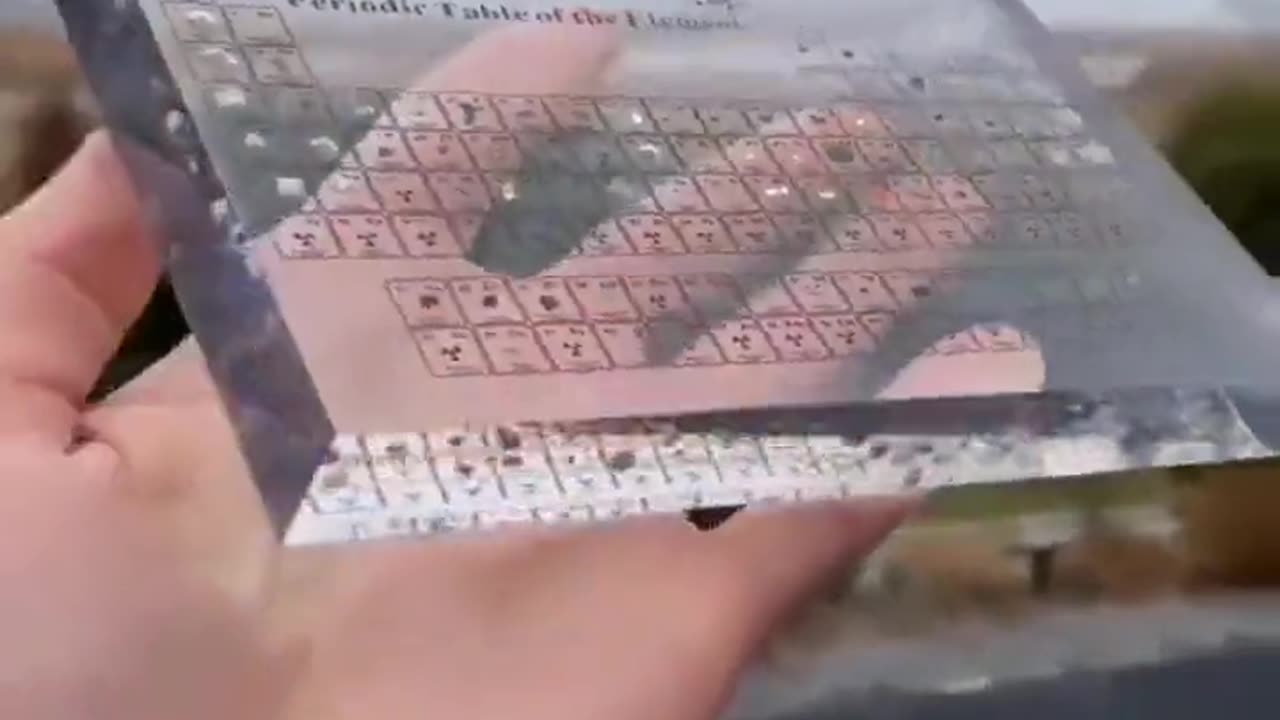 This periodic table uses real element samples encased in clear acrylic