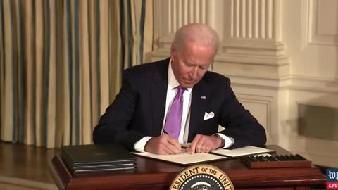 President Joe Biden Unable to Place Pen in Suit Jacket