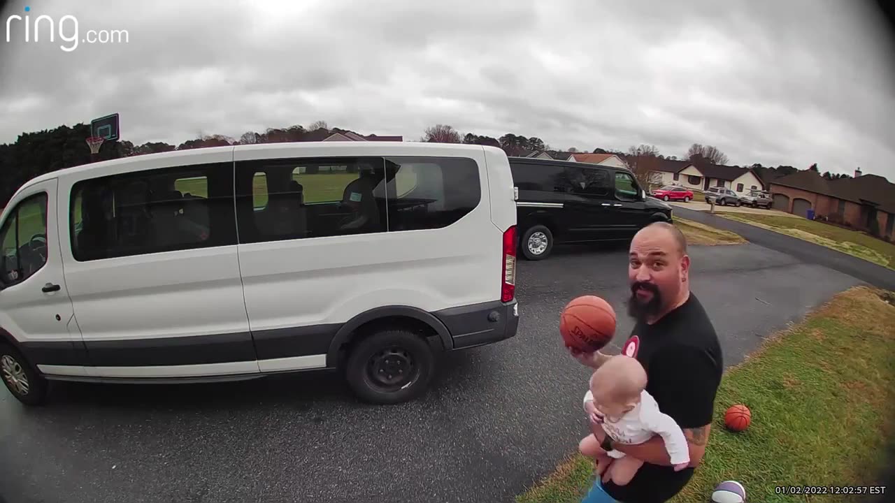 Rebound master performs unbelievable trick shot with baby in hand