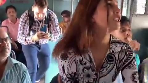 Girl dance in running train