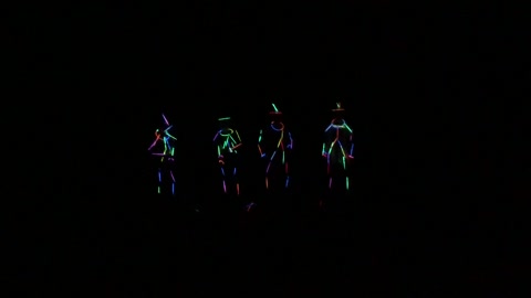 Glow in the dark boys dancing