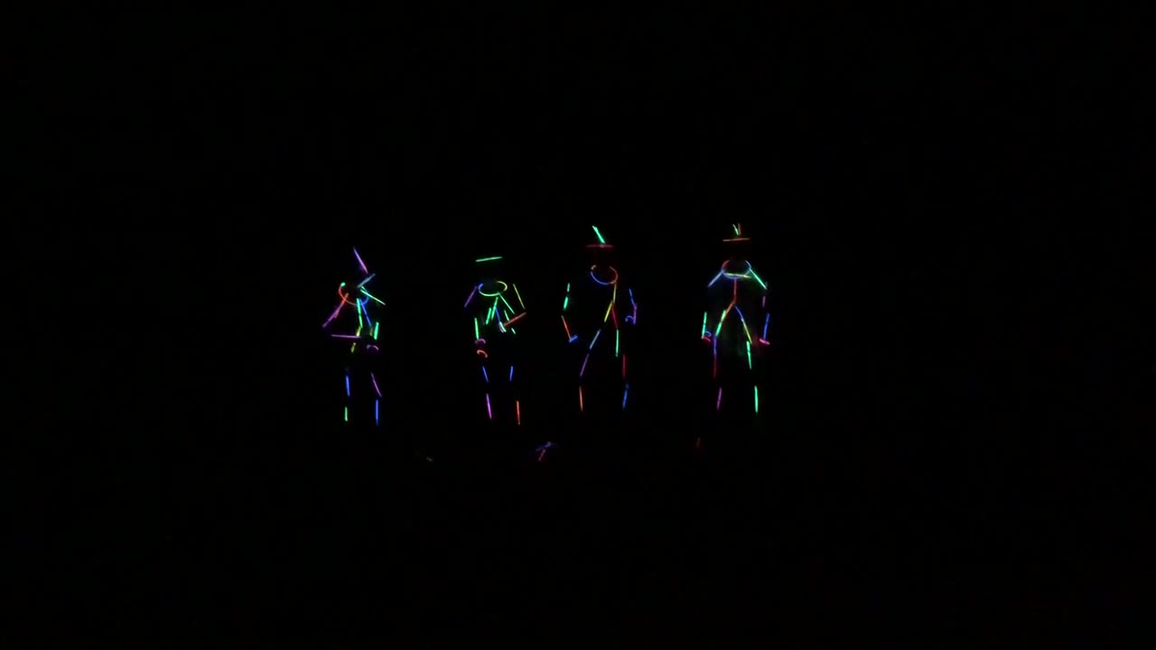 Glow in the dark boys dancing