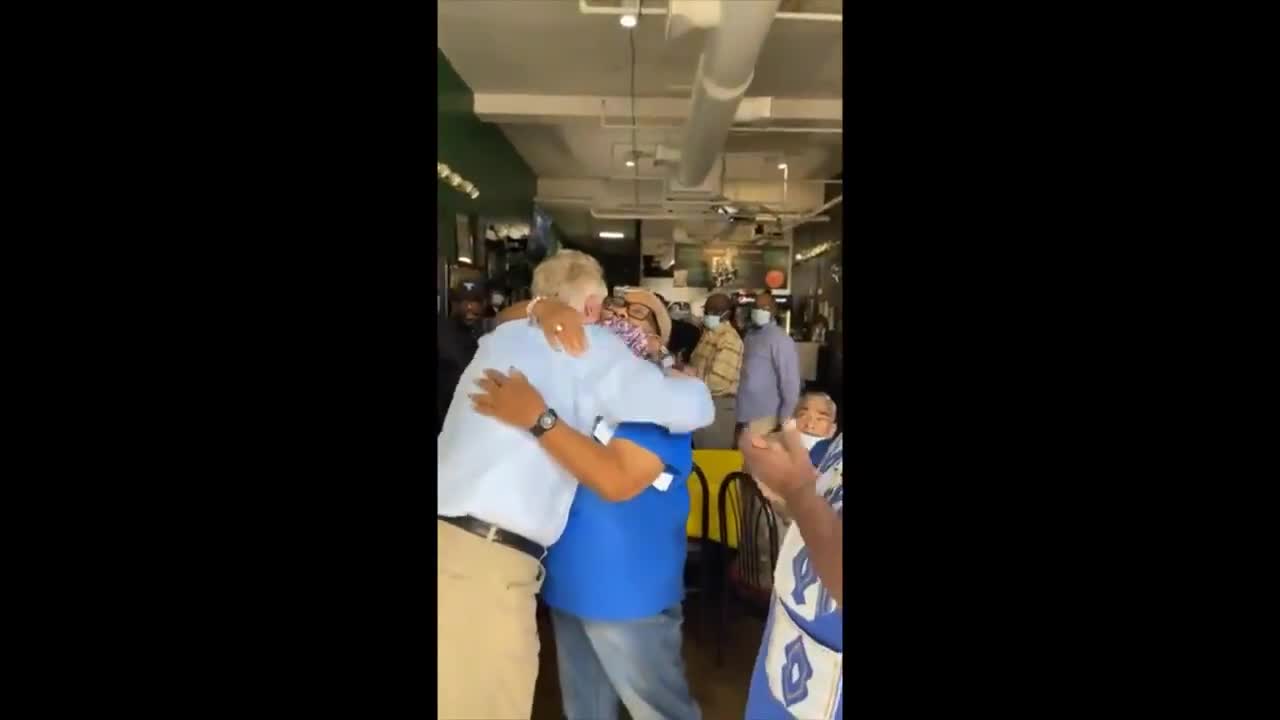 Only days after condemning unmasked reporter, Maskless McAuliffe breathing all over people.